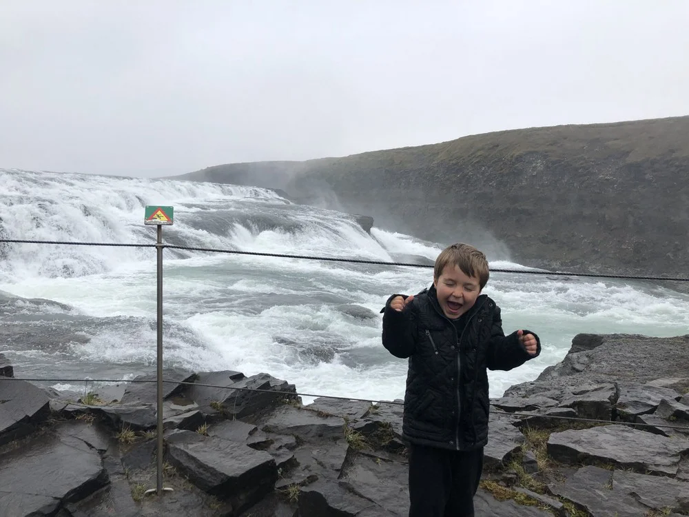 Iceland Golden Circle - Kid getting wet at Gulfoss Falls
