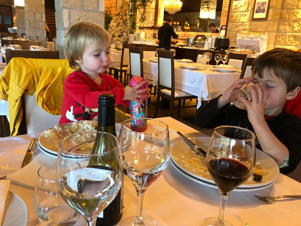 Porto Portugal - Kids having dinner at a fancy restaurant