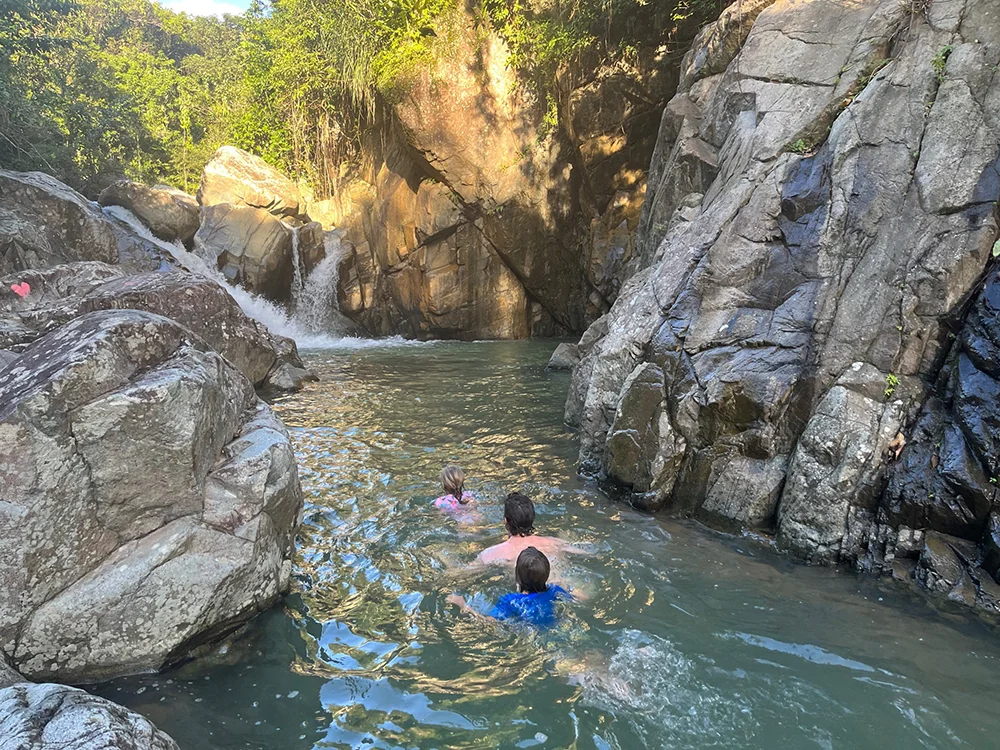 Swimming up to Cascada El Survivor near Patillas, Puerto Rico