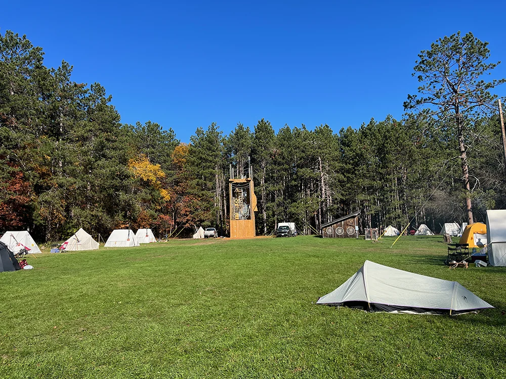 Winter Camping Symposium - Row of winter tents set up at YMCA Camp Miller