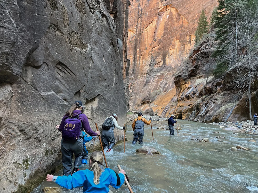 Zion National Park - Family walking the Narrows with young children